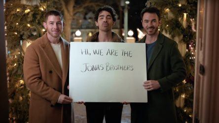 The Jonas Brothers Went Full Love Actually To Announce Their Return To Disney, And Christmas Movie Fans Will Be Pumped