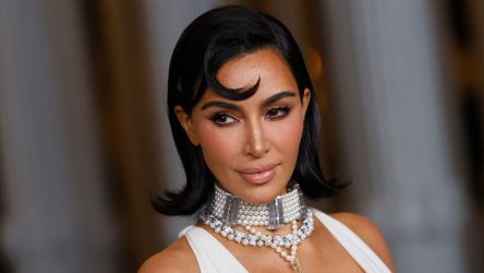 How Kim Kardashian Channeled Princess Diana In A Low-Cut White Gown And Cross Necklace