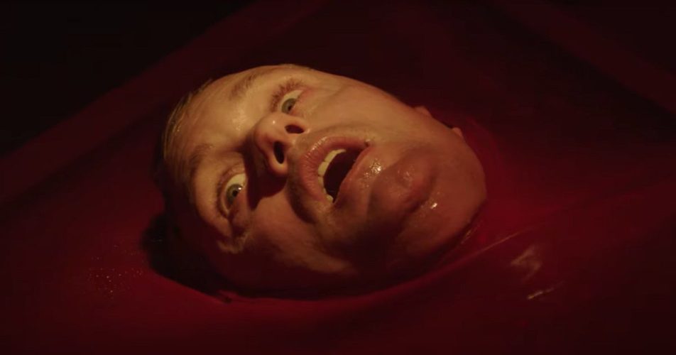 Infinity Pool Trailer Teases Brandon Cronenberg's Warped Tale of Hedonism & Violence