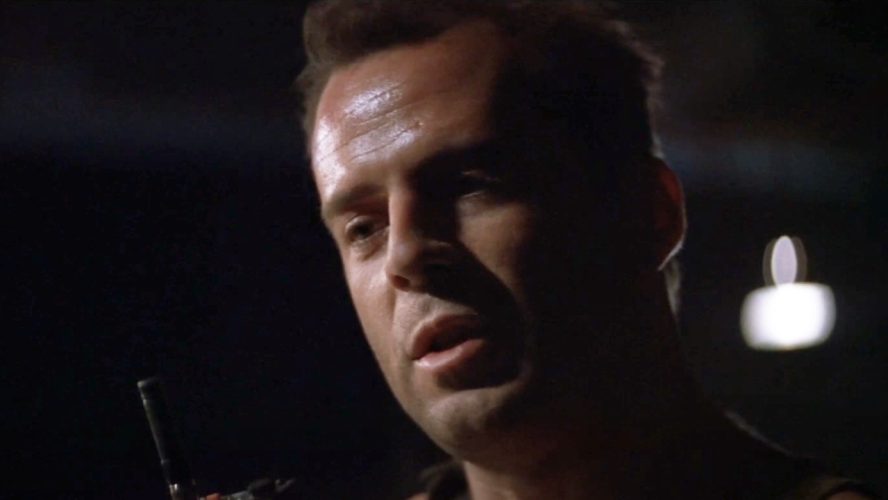 The Story Behind Bruce Willis' Explosive Roof Jump Stunt In Die Hard